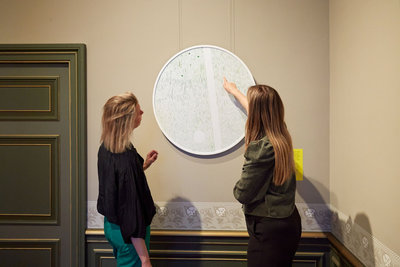 Visitors in the exhibition 'Anne Geene. Out of the Ordinary'