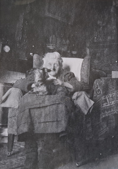 Barbara van Houten in a chair with a dog on her lap, 1935–50. Collection Groninger Museum
